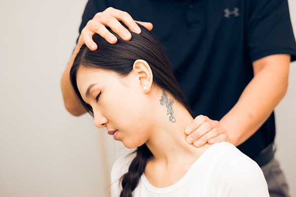 Chiropractor Redondo Beach CA Eric Yu Neck Adjustment